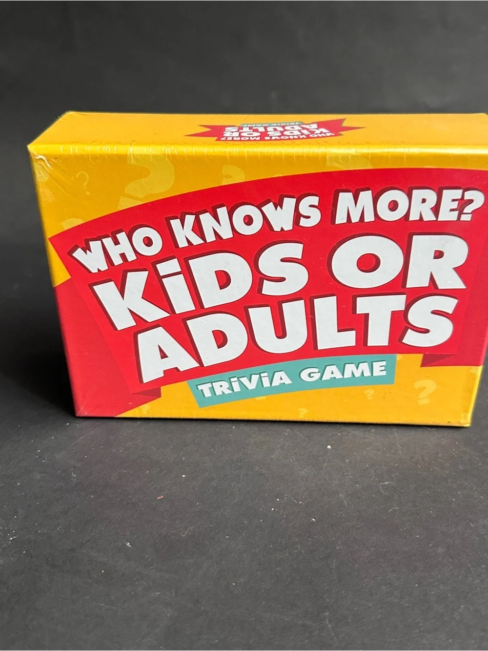 NEW- Who Knows More? Kids or Adults Trivia Game - Yellow/Red